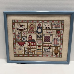 May include: A rustic wooden sign with the text "Welcome to our home" in white lettering. The sign features a distressed finish and a simple, inviting design, perfect for a front porch or entryway.