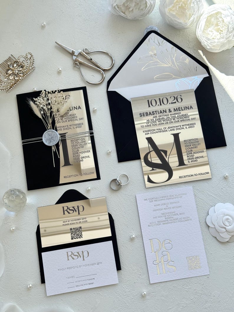 May include: Elegant wedding invitation suite featuring black and gold accents. Includes invitation cards, RSVP cards, and details cards. The invitations have a modern design with metallic gold lettering and a black envelope.