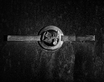 Buick art print in black and white of a buick 8 emblem from a antique buick car perfect for man cave or garage art