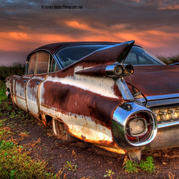 1950s Cadillac with fins at sunset rusting away in South Dakota fine art photography print or metal wall art perfect for the garage wall