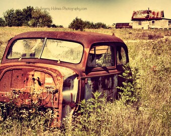 old rusty car with old house in Texas fine art photography print or metal wall art perfect for the garage wall
