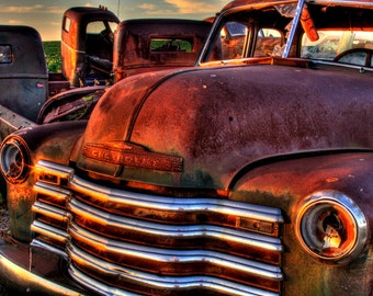 Rusty Chevy Trucks sitting abandon at sunrise in South Dakota, Fine art