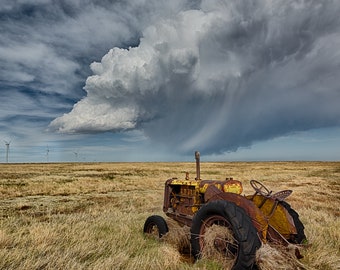 Farm tractor rusting on the plains of Colorado