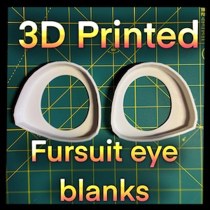 May include: Two white 3D printed fursuit eye blanks. The eye blanks are oval-shaped with a circular opening in the center. The text "3D Printed" and "Fursuit eye blanks" are displayed in a gradient font.