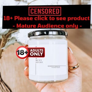 May include: A clear glass jar with a black lid, held in a hand. The jar has a white label with the text "BUTT STUFF" and "ADULTS ONLY" on a red sticker. The image also contains the text "CENSORED" and "18+ Please click to see product - Mature Audience only -"