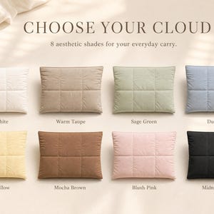 May include: Eight rectangular quilted pillows arranged in two rows. Colors include Cloud White, Warm Taupe, Sage Green, Dusty Blue, Butter Yellow, Mocha Brown, Blush Pink, and Midnight Black. Text reads CHOOSE YOUR CLOUD and 8 aesthetic shades for your everyday carry.
