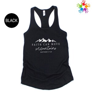 A black tank top with a white graphic design and text printed on it.