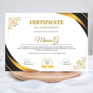 May include: A certificate of achievement with gold and black detailing. The certificate includes the text "CERTIFICATE OF ACHIEVEMENT" and "Mason.G". The date on the certificate is December 25th, 2025.