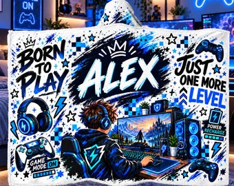 May include: A hooded blanket featuring a blue and white gaming theme with the name ALEX in the centre. The design includes text reading BORN TO PLAY and JUST ONE MORE LEVEL, along with graphics of headphones, game controllers, and a gamer.