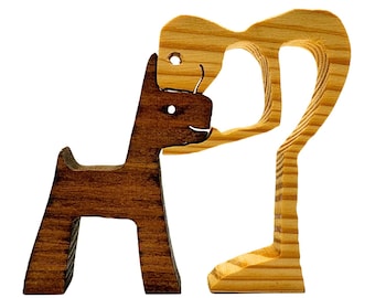Handcrafted Wooden Dog and Person Figurine
