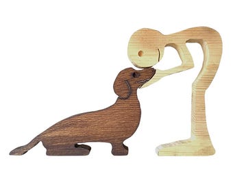 Handcrafted Wooden Dachshund and Person Figurine
