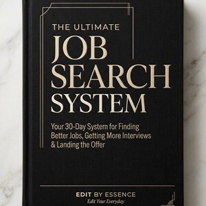 May include: A black hardcover book titled The Ultimate Job Search System: Your 30-Day System for Finding Better Jobs, Getting More Interviews & Landing the Offer, with Edit By Essence and Edit Your Everyday printed in gold lettering on the front cover.