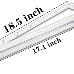 May include: A clear plastic shelf divider with a hinged design. The dimensions are labeled as 18.5 inches in length, 17.1 inches in length, 1.2 inches in width, and 0.9 inches in height. The structure features a long, transparent rectangular bar.