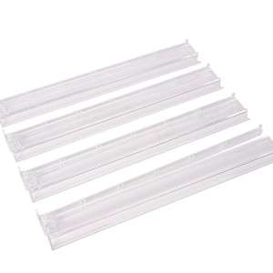 May include: Four clear, rectangular plastic shelf dividers. Each divider has a channel running along its length and small tabs at each end. The dividers are designed to organize shelves and maximize storage space.