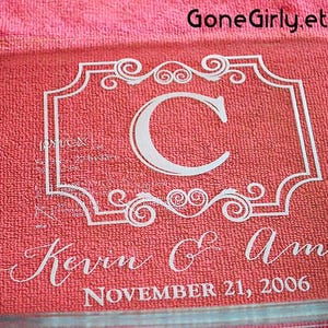 May include: Clear glass baking dish with a red background. The dish features a white decorative frame with the letter "C" in the center, along with the names "Kevin & Amy" and the date "November 21, 2006".