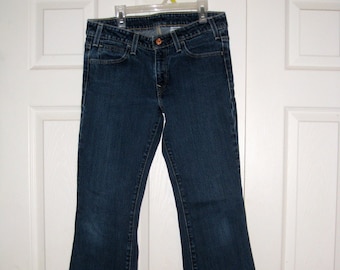 Women's Vintage Levi's Quincy Flare Jeans, Made in USA, Size 30M (30"W x 32"L), Run In Fabric On Front Left Lower Leg
