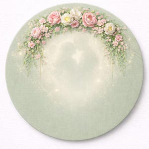 May include: Round, light green wedding invitation featuring a floral arch of pink and white roses, small pink flowers, and greenery. The arch frames a silhouette of a couple. The background has a soft, glowing effect.