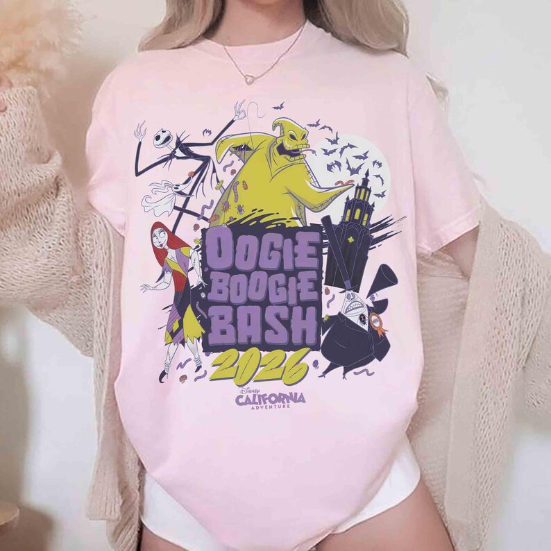 May include: A light pink t-shirt featuring characters from The Nightmare Before Christmas. The shirt has the text "Oogie Boogie Bash 2026" and "Disney California Adventure". The design includes Jack Skellington, Sally, Oogie Boogie, and Zero.