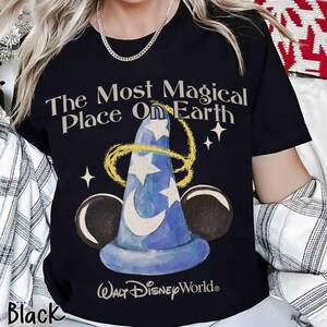 May include: Black t-shirt with the text "The Most Magical Place On Earth" and a blue wizard hat design. The shirt also features the "Walt Disney World" logo and Mickey Mouse ears. A classic design.