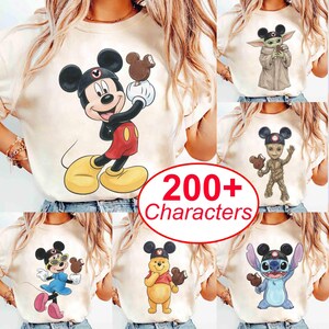 May include: Cream-colored t-shirts featuring various Disney characters with Mickey Mouse ears and ice cream treats. Characters include Mickey Mouse, Baby Yoda, Groot, Minnie Mouse, Winnie the Pooh, and Stitch. The image includes the text "200+ Characters".