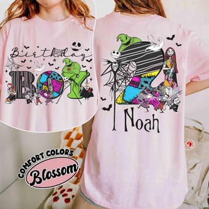 May include: A light pink t-shirt featuring The Nightmare Before Christmas characters. The front displays the text Birthday BOY with Oogie Boogie and Jack Skellington. The back shows a large number 2, the name Noah, and various movie characters.
