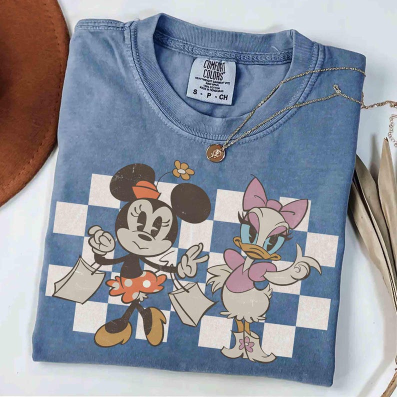 May include: A set of three ceramic mugs with a speckled, matte finish. The mugs are in shades of cream, light gray, and dark gray. Each mug has a simple, minimalist design, perfect for coffee or tea.