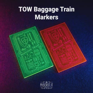 May include: Two rectangular markers, one green and one orange, with the text "TOW Baggage Train Markers." Each marker features a detailed etched design of weapons, barrels, and other items. The website "MISCAST.IT" is at the bottom.