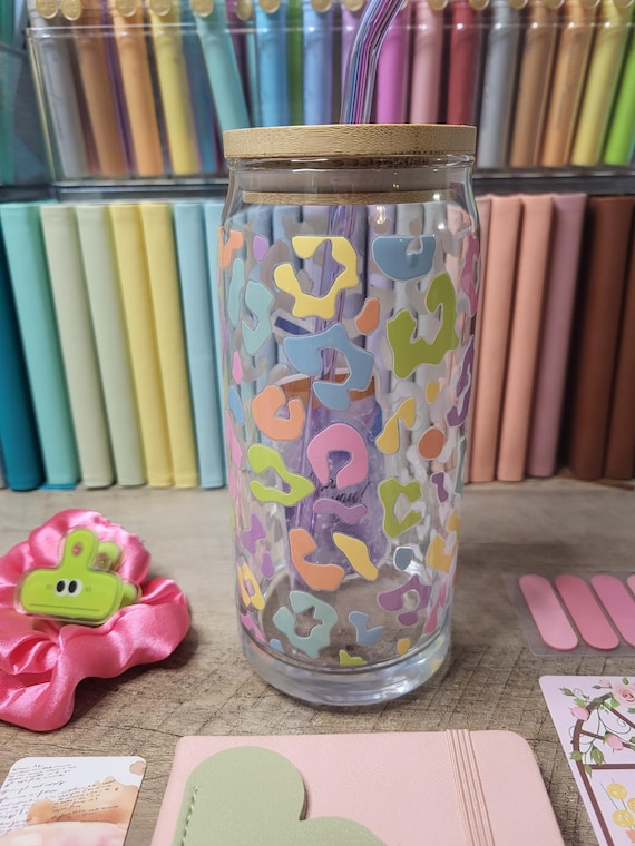 Adorable leopard print cup with straw & lid.