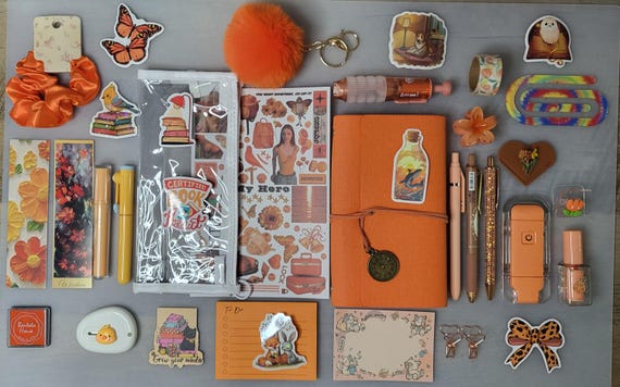 Orange Bookish Bundles for book lovers, stationery lovers, and those who love journaling.