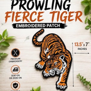 May include: An embroidered patch featuring a prowling tiger with orange and white thread on a black background. The patch measures 34.3 cm by 17.8 cm. Text reads PROWLING FIERCE TIGER EMBROIDERED PATCH, PREMIUM EMBROIDERY, SEW-ON OR IRON-ON, DURABLE & LONG LASTING.