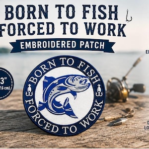 May include: A circular embroidered patch featuring a blue and white fish graphic with the text BORN TO FISH FORCED TO WORK. The patch measures 7.6 cm by 7.6 cm and includes icons for premium embroidery, iron-on application, and durability.