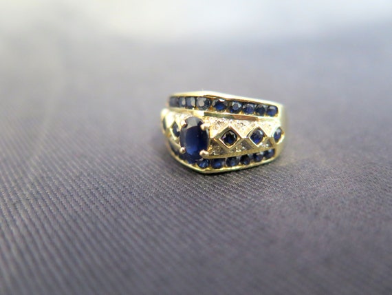 14k Stunning Sapphire-like Diamond Ring - image 6