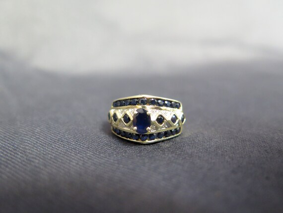 14k Stunning Sapphire-like Diamond Ring - image 1