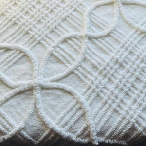 All over bright White Lattice and weave pattern that is so unique in This Vintage Chenille Fabric. Available in Multiple cut sizes.