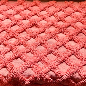 Beautiful bright salmon diamond lattice pattern. So pretty!  Vintage Chenille Fabric. Cut size 24x11”