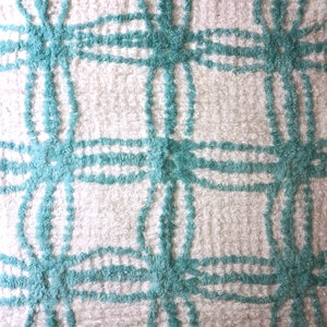 Plush white & mint green wedding ring pattern. This Vintage Chenille Fabric is available in Various cut sizes.