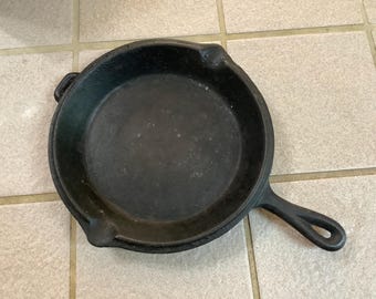 Cast Iron Skillet Lid Combo. Two Pour Spouts. Unbranded. Does need cleaning. Not sure of date.