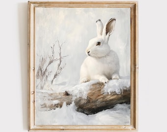 ウサギの壁掛けアート – 雪の積もった丸太の上の白い野ウサギ、アンティーク調プリント 36