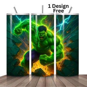 May include: A set of three stainless steel tumblers featuring a vibrant illustration of the Hulk. The design showcases the Hulk in a dynamic pose, with a background of lightning and shattered rock. The text "1 Design Free" is visible.