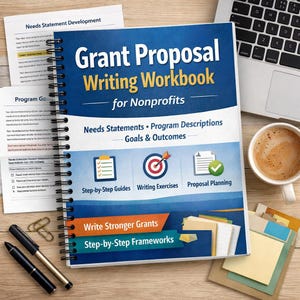 May include: A spiral-bound "Grant Proposal Writing Workbook for Nonprofits" with blue and white cover. The cover text includes "Needs Statements, Program Descriptions, Goals & Outcomes." The image also shows a laptop, coffee cup, and documents.