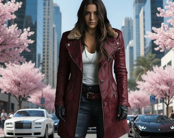 May include: A burgundy leather coat with a fur collar, worn over a white top and dark jeans. The coat has a belted waist and button details. Black gloves complete the look. The background features a city street with cars and cherry blossom trees.