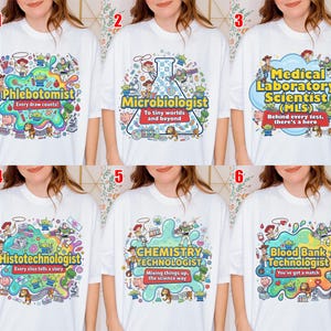 May include: White t-shirts with colorful cartoon graphics and text. The shirts feature various medical professions: Phlebotomist, Microbiologist, Medical Laboratory Scientist, Histotechnologist, Chemistry Technologist, and Blood Bank Technologist.