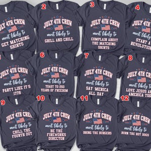 May include: A selection of navy blue t-shirts with 4th of July themed designs. Each shirt displays the text "July 4th Crew" and a phrase such as "Get Matching Shirts" or "Grill and Chill", accompanied by an American flag.