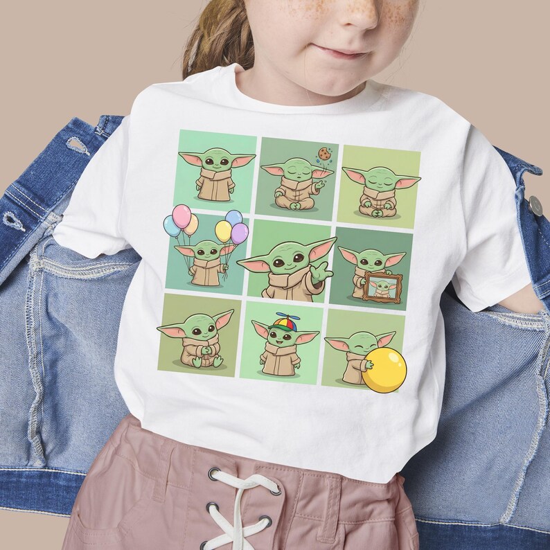 May include: White t-shirt with a grid of nine cartoon images of a green alien character. Each image shows the character in different poses, some holding balloons or a yellow ball. The shirt is worn by a person.