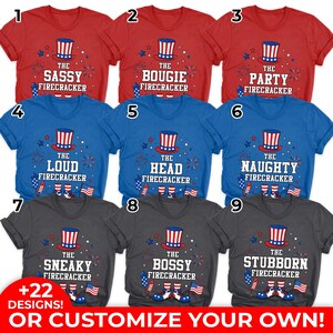 May include: Nine t-shirts in red, blue, and gray, each with a unique patriotic design. The shirts feature a top hat graphic and the words "Sassy," "Bougie," "Party," "Loud," "Head," "Naughty," "Sneaky," "Bossy," and "Stubborn Firecracker."