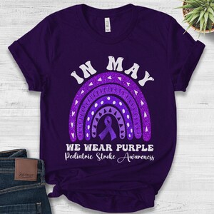 Purple Ribbon Awareness Tee, In May We Wear Purple Shirt, Pediatric Stroke Warrior Gift, Health Support Mom Shirt, Pediatric Gift NGQY15