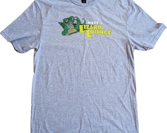 Camiseta Gildan SoftStyle gris jaspeado de Nate's Lizard Lounge