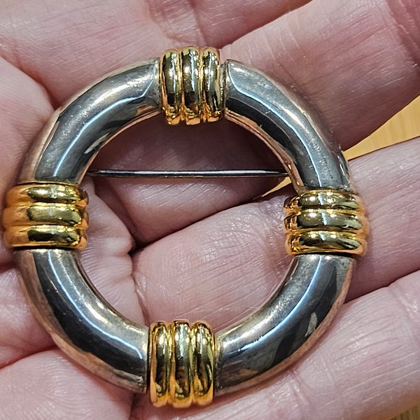 Vintage two tone silver  brooch with gold touches about 1 3/4 inches in very good Vintage condition!