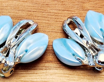 Silvertone vintage clip on earrings bee in blue silk.