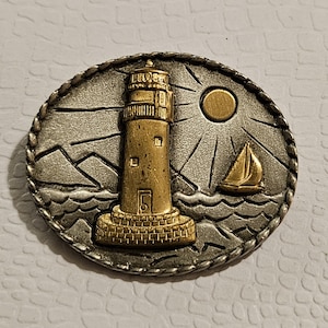Vintage J.J. tinnen vuurtorenbroche in zeer goede vintage staat!